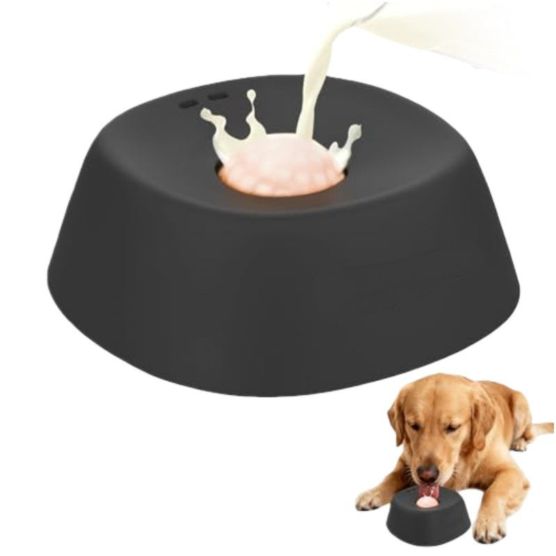 Black dog bowl with a splash of milk and a dog eating from it on a white background