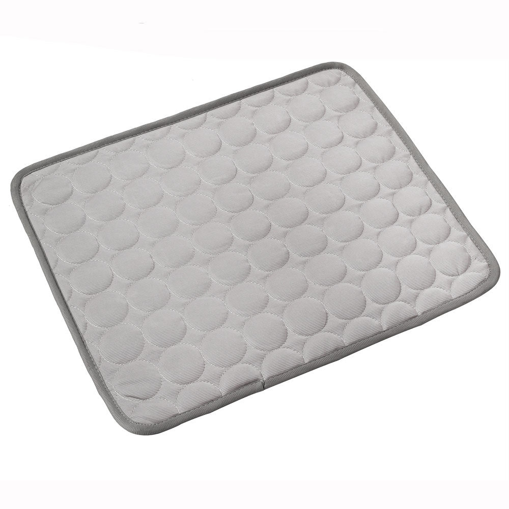 Gray bath mat with textured surface on a white background