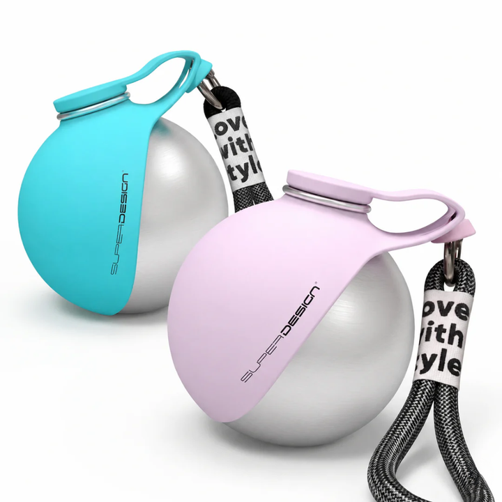 Two stainless steel pet water bottles in pink and teal color with lanyards on a white background